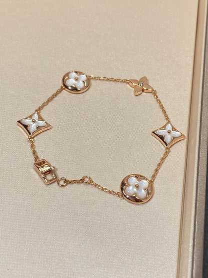 [AuraEcho]STAR AND SUN 5 MOTIF MOP PINK GOLD BRACELET